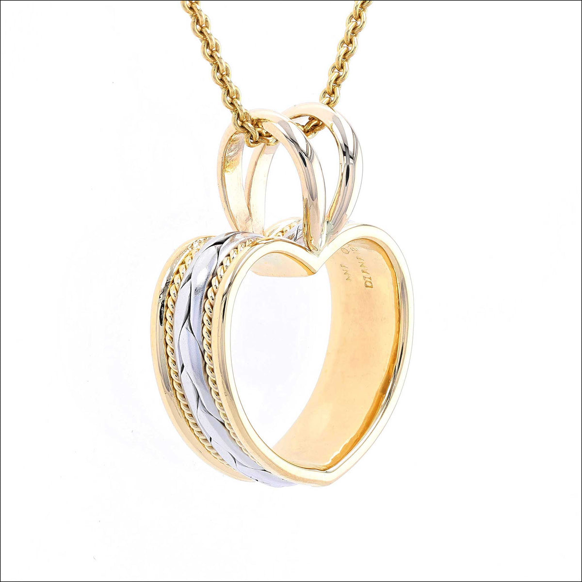 Wedding band reshaped into heart pendant, before and after