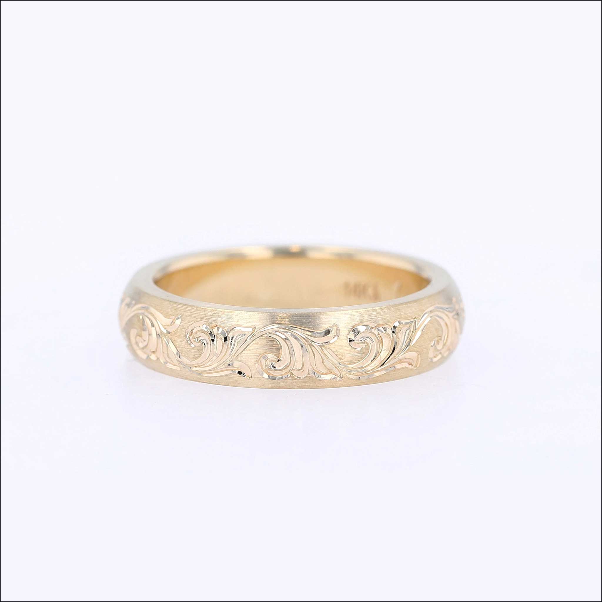 hand engraved scroll pattern on wedding band