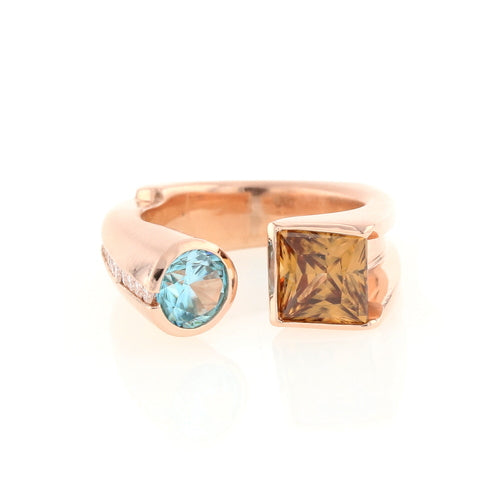 rose gold blue zircon and brown diamond kissing ring
