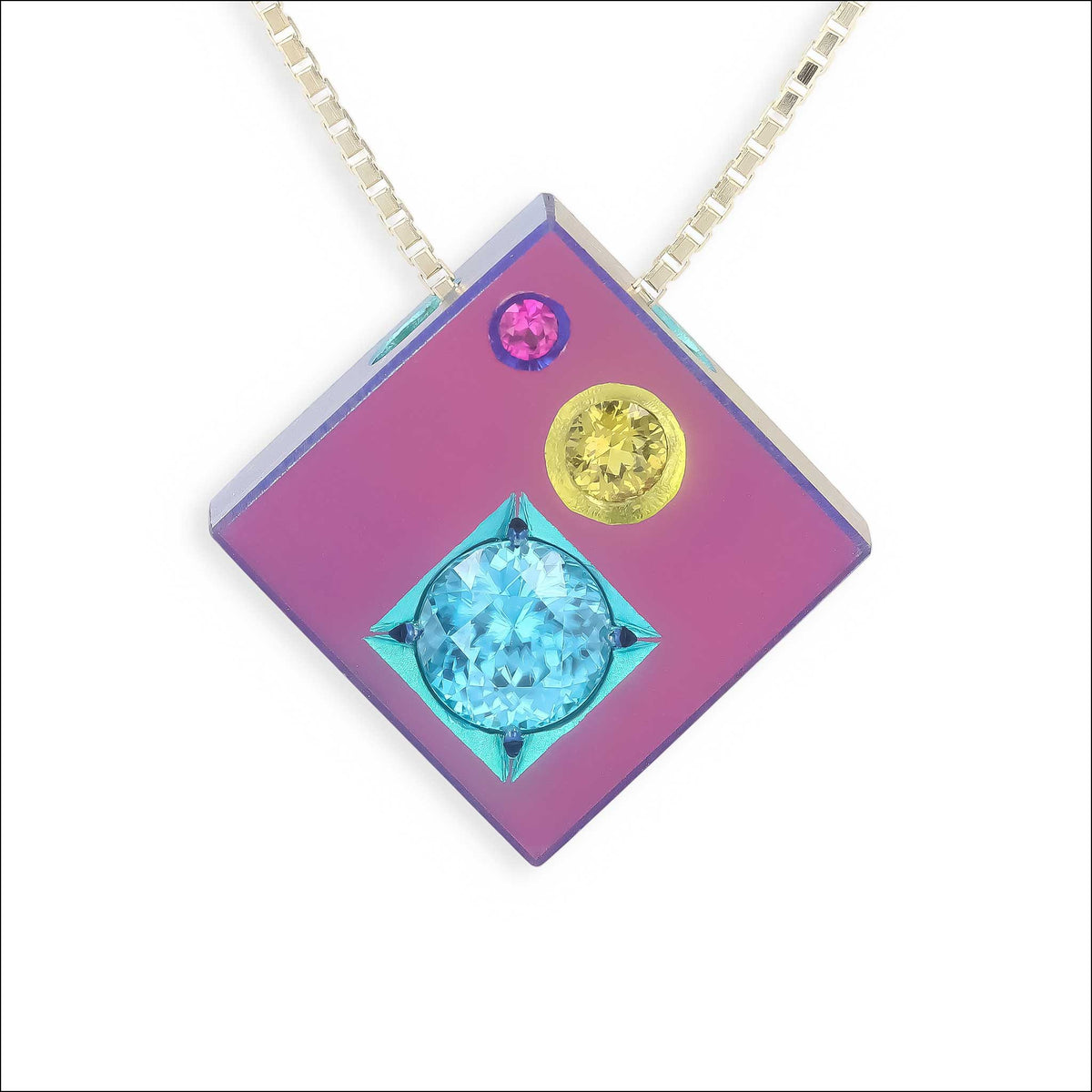 "Cubic Prism" Blue Zircon Pink Sapphire Yellow Sapphire Anodized Niobium Pendant front, handcrafted pendant | Jewelsmith Durham, NC