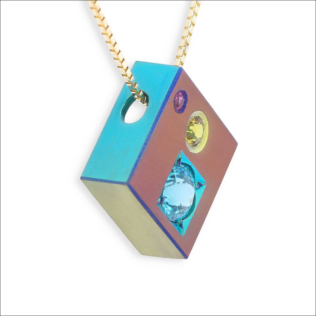 "Cubic Prism" Blue Zircon Pink Sapphire Yellow Sapphire Anodized Niobium Pendant side, handcrafted pendant | Jewelsmith Durham, NC