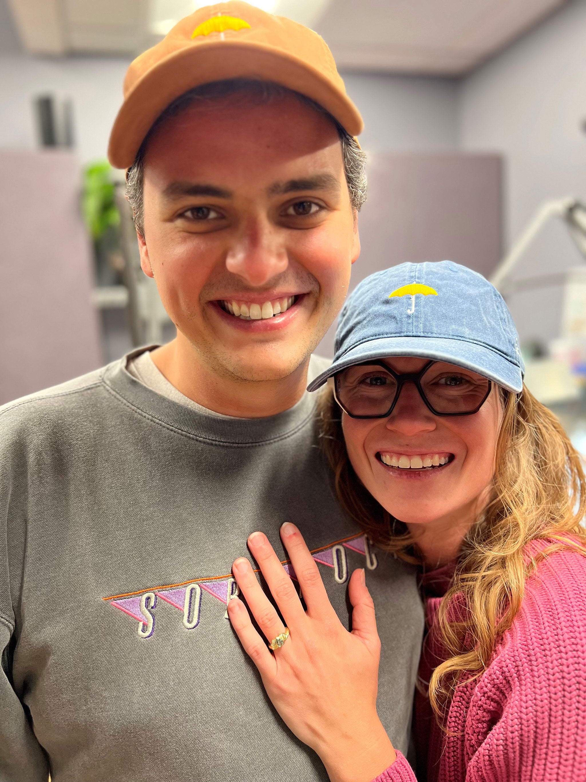 happy custom engagement ring couple