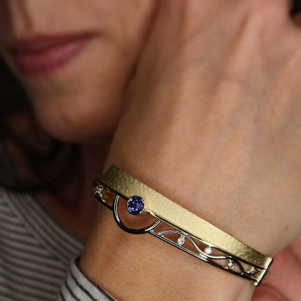 model wearing sapphire diamond bracelet
