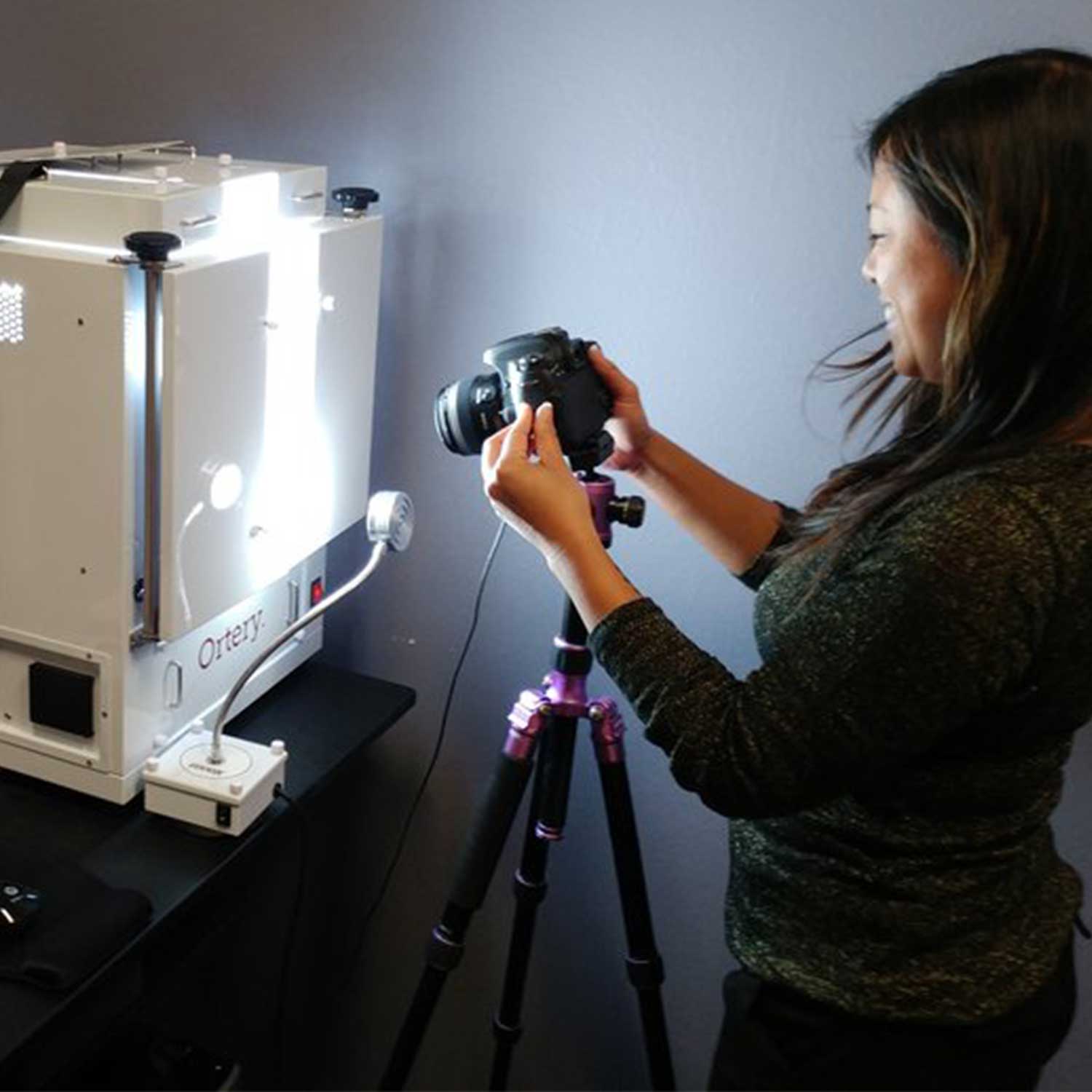 kristine taking photographs of jewelry