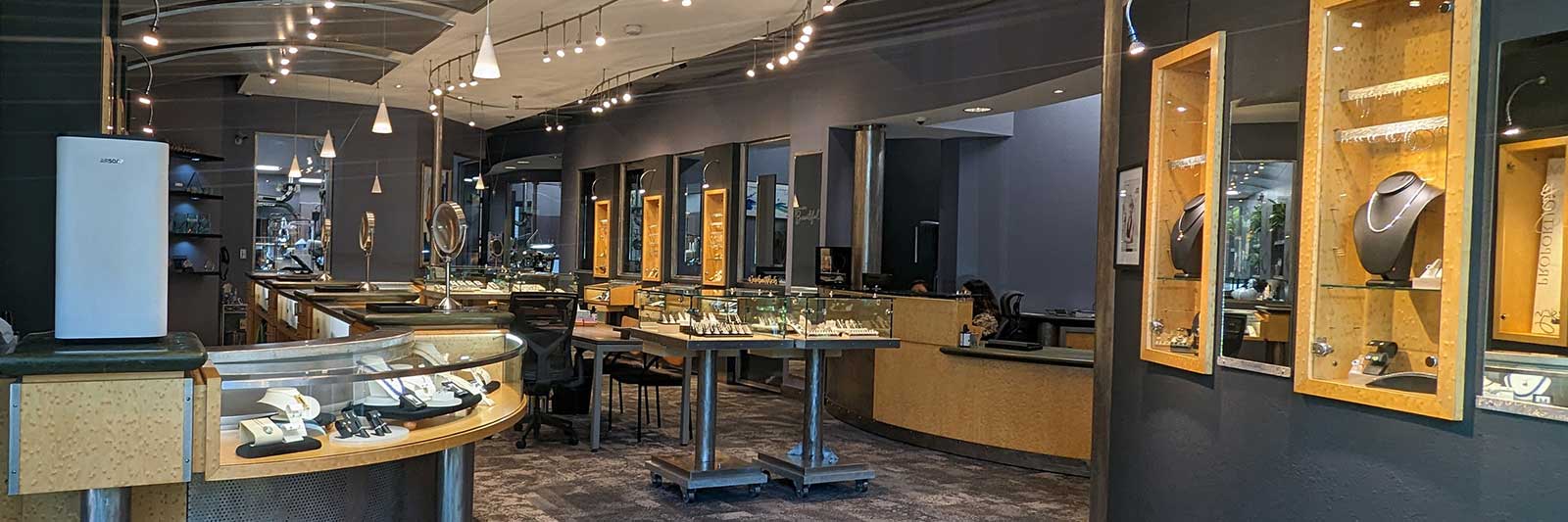 Jewelsmith showroom interior with view of workshop in background
