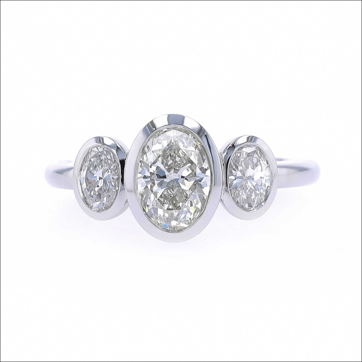 Three Stone Oval Diamond Floating Bezel Engagement Ring Platinum - JewelsmithEngagement Rings