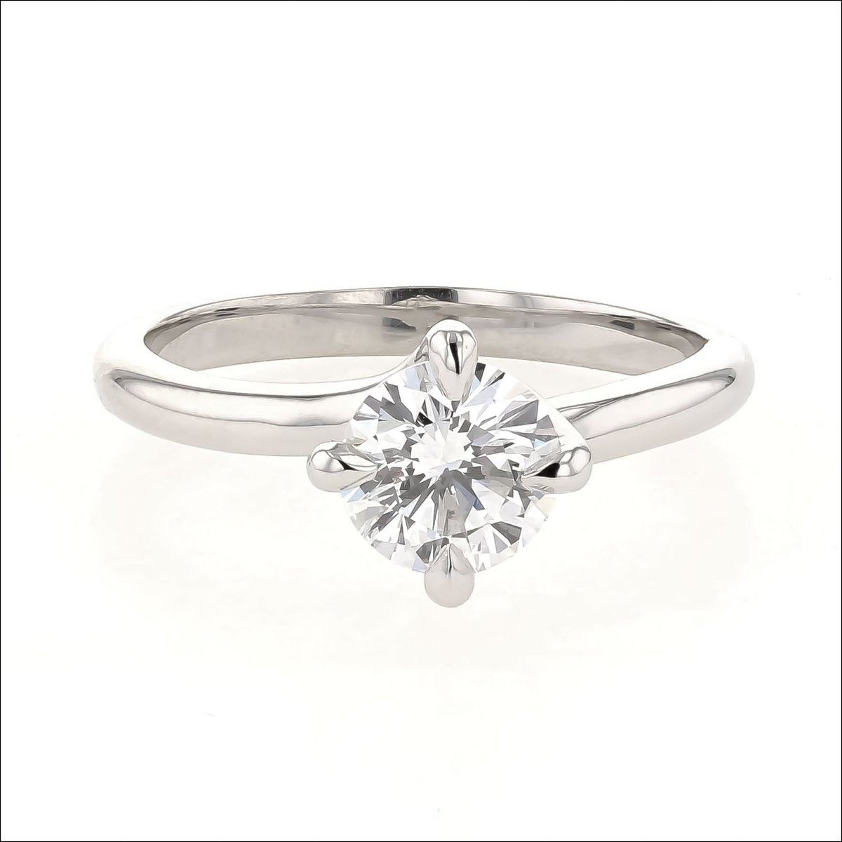 Diamond 4 Prong Twist Solitaire Engagement Ring Platinum - JewelsmithEngagement Rings