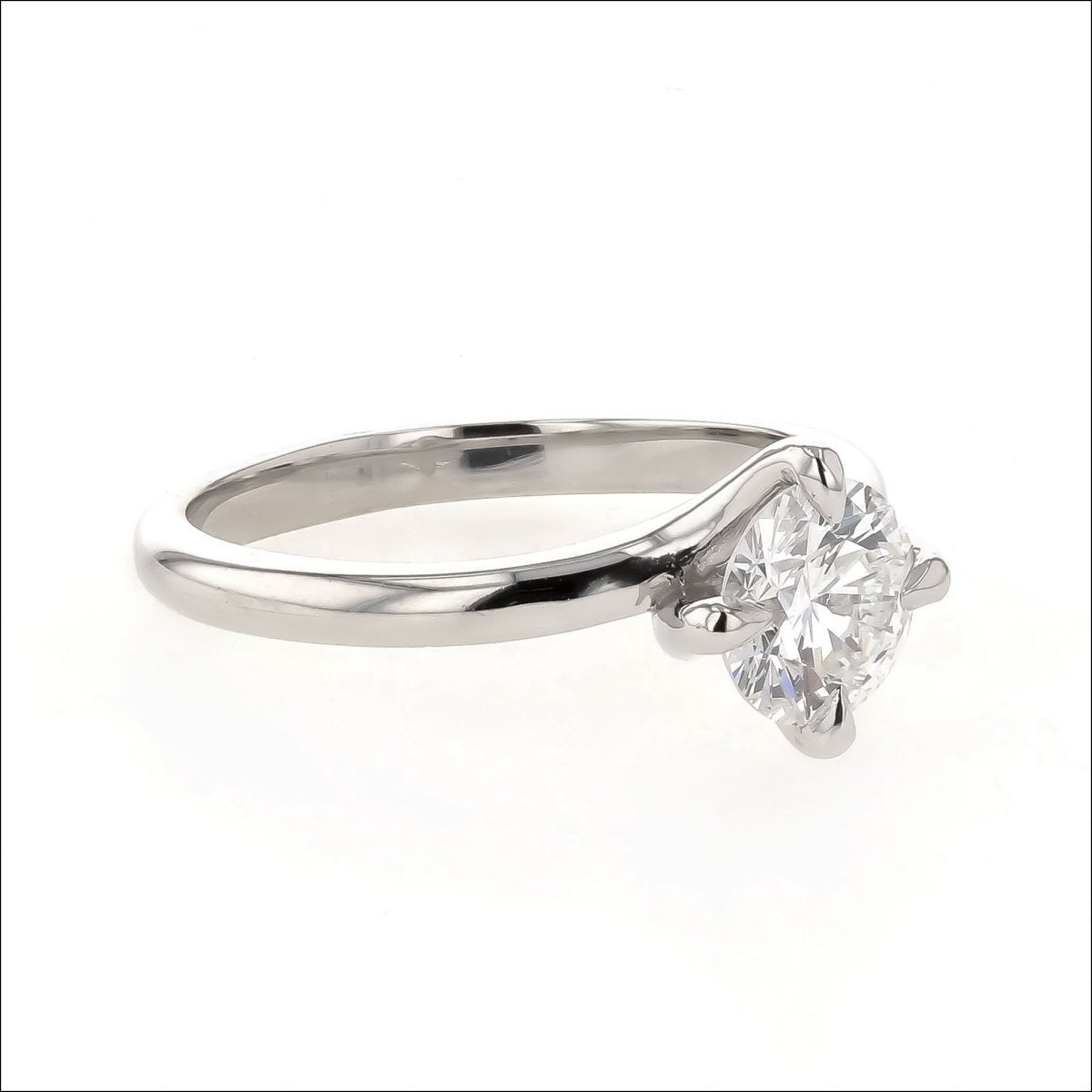 Diamond 4 Prong Twist Solitaire Engagement Ring Platinum - JewelsmithEngagement Rings