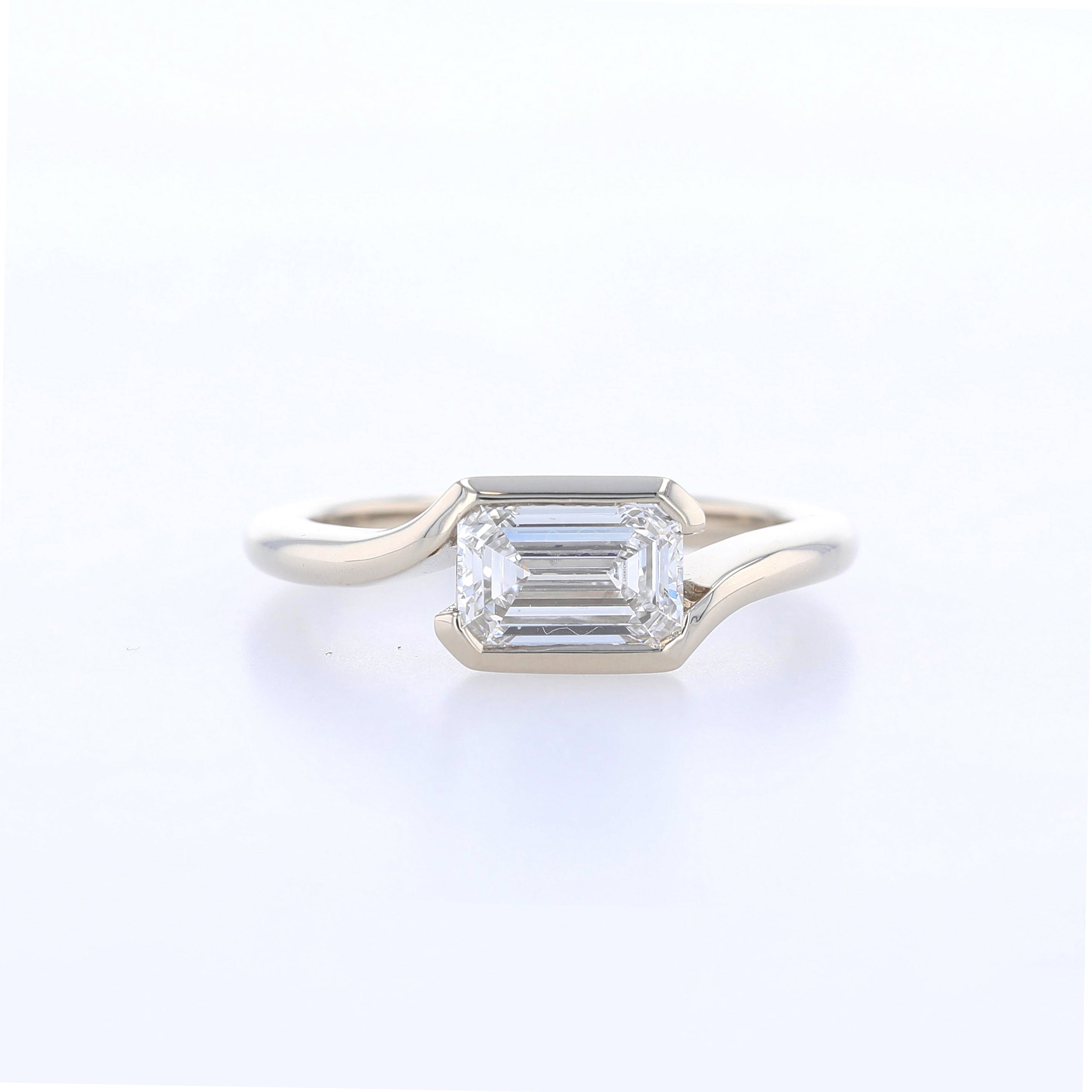 emerald cut bypass engagement ring