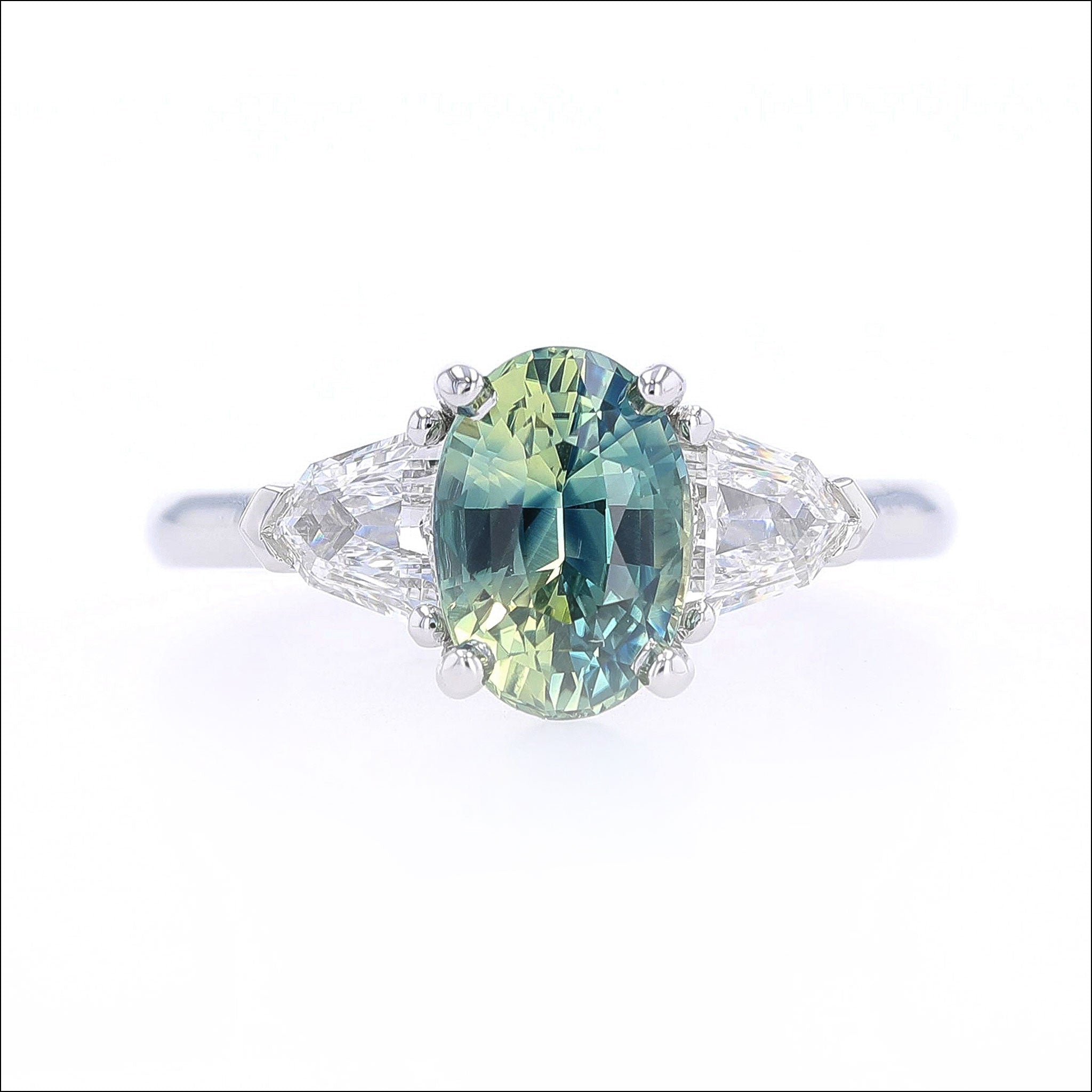 parti color green and teal Montana sapphire and diamond engagement ring