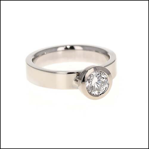 post and pillars floating bezel engagement ring