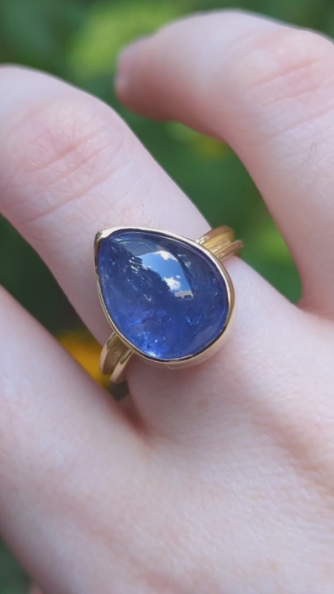 Pear Shaped Tanzanite Cab Ring 18KY video on model outdoors