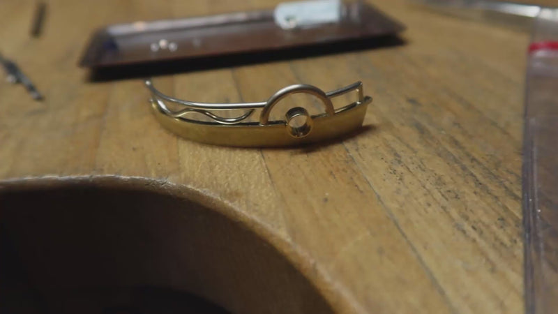 goldsmith Patrick King handcrafting a custom sapphire and diamond bracelet. Shows soldering, hammering, gemstone setting and finishing