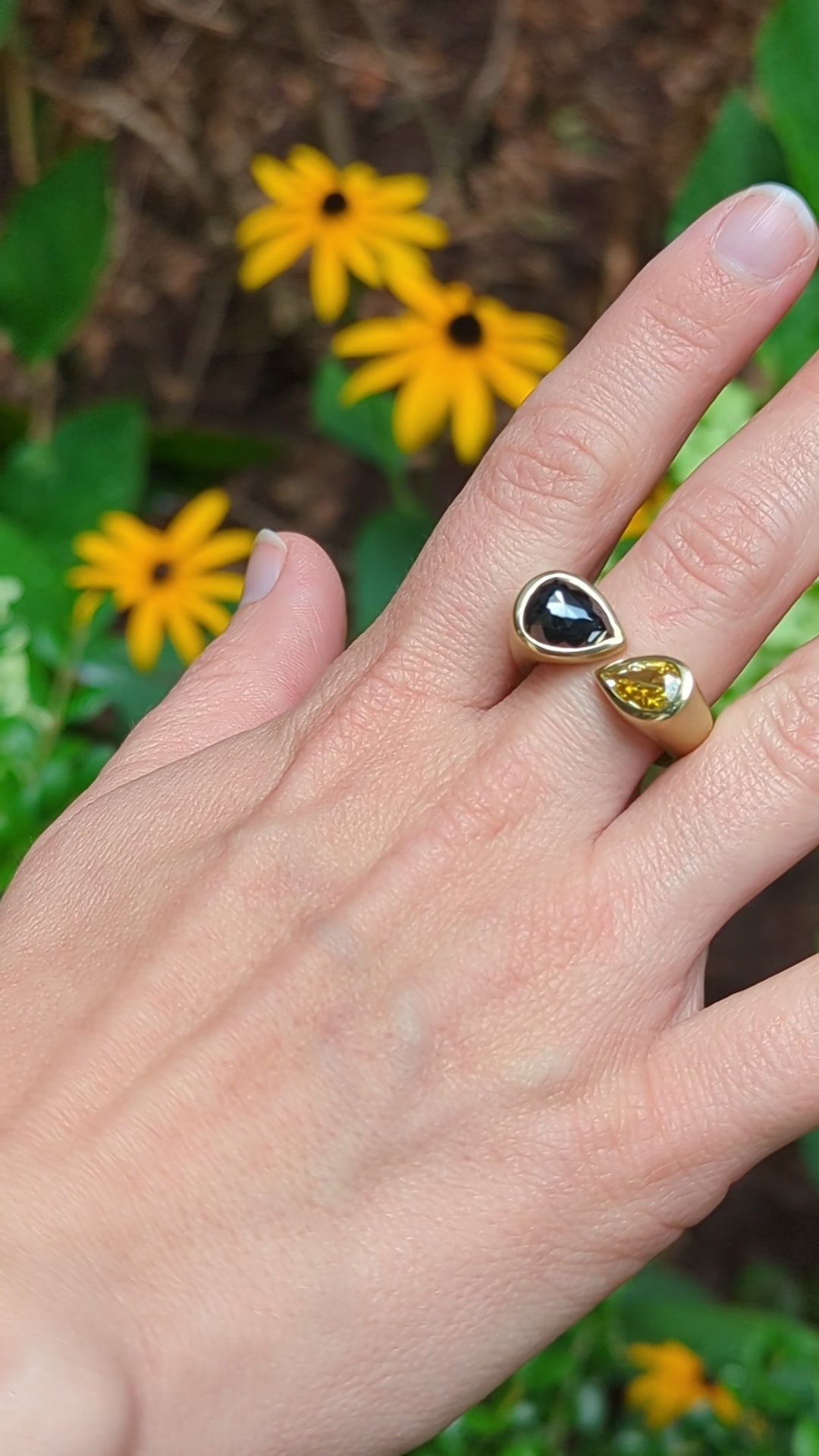 Pear Shaped Black and Yellow Diamond Kissing Ring 18KY video on model outdoors