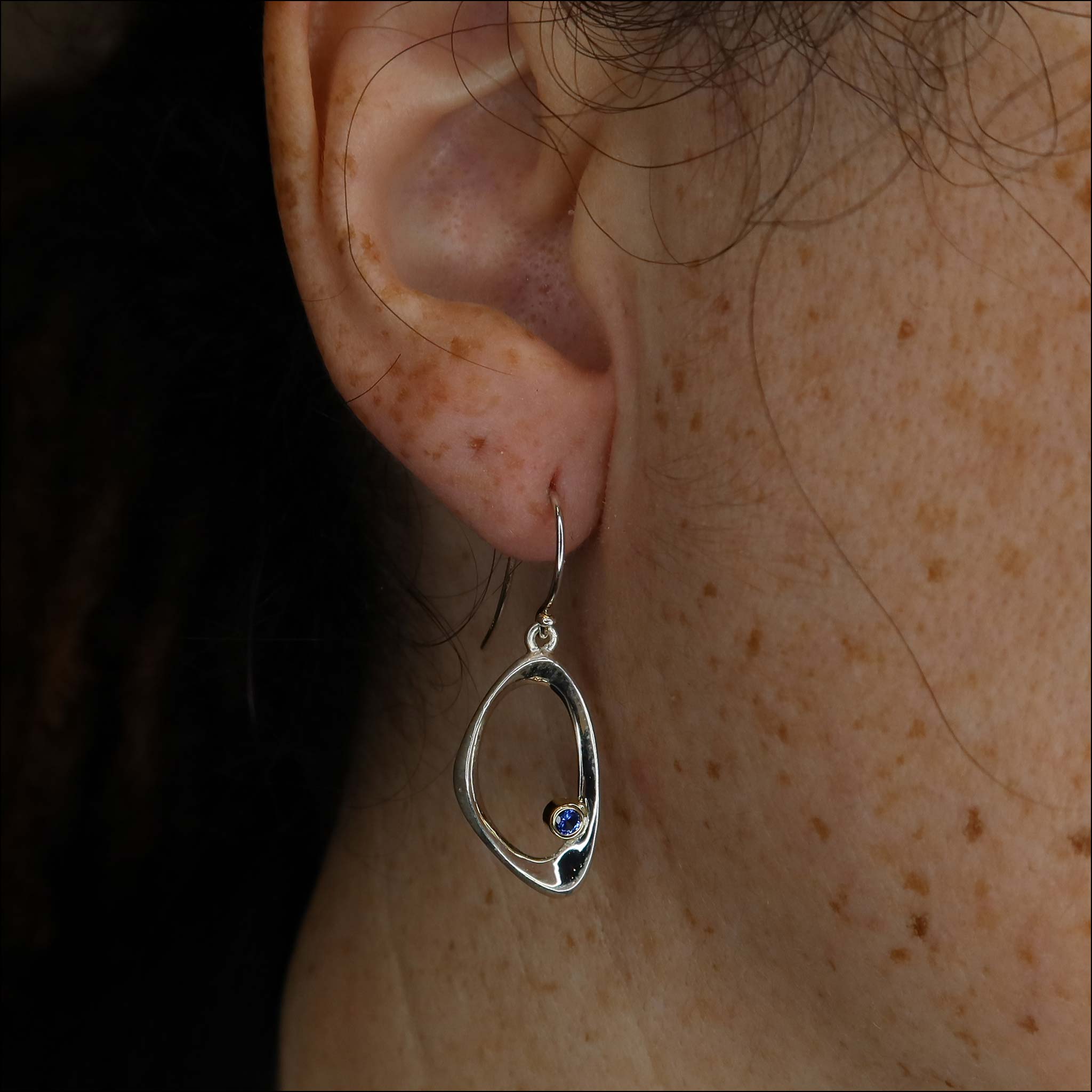 sapphire shapes earrings on model