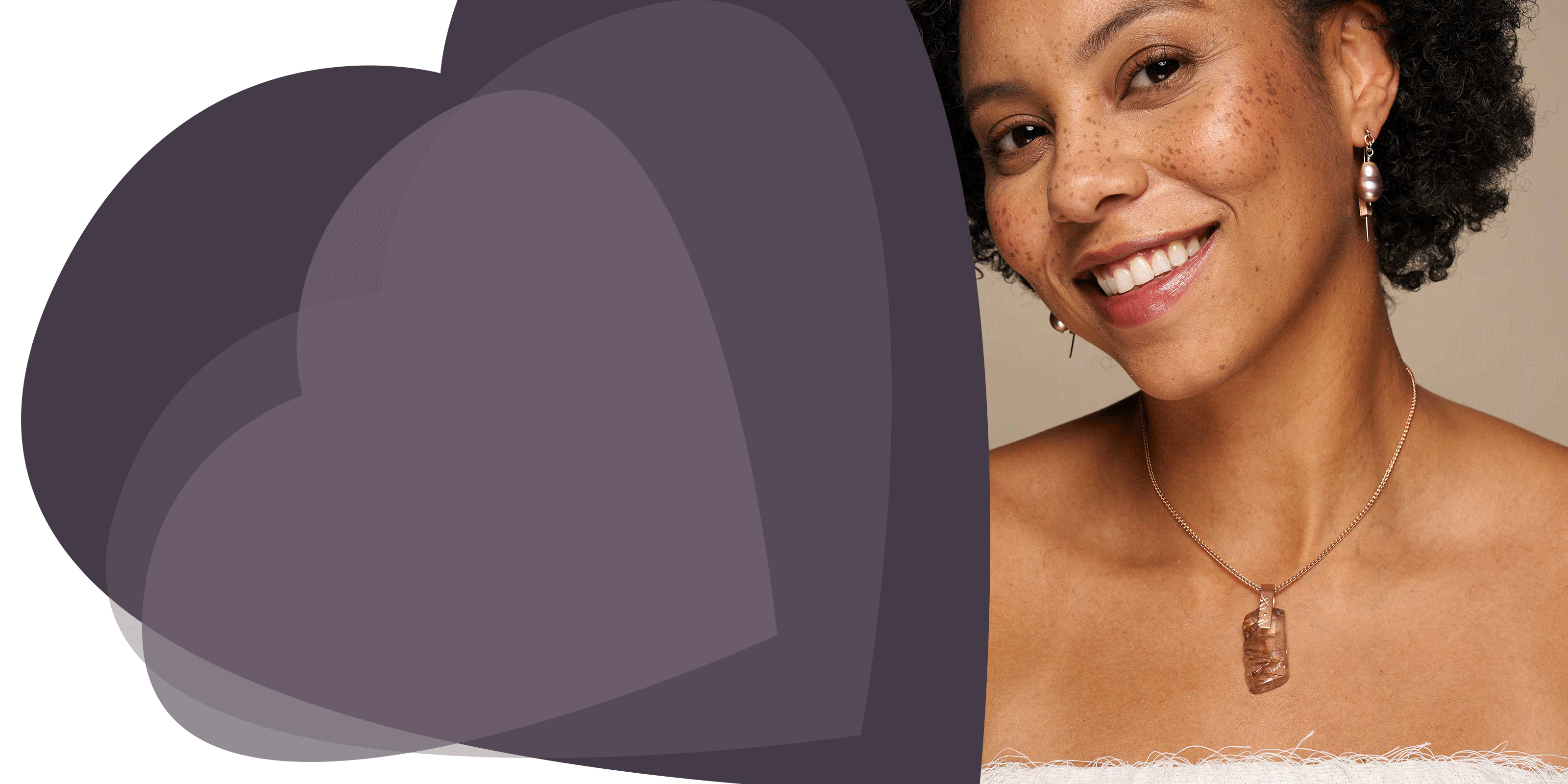 model wearing rutilated quartz pendant and freshwater pearl threader earrings. photo by Alonza Mitchell